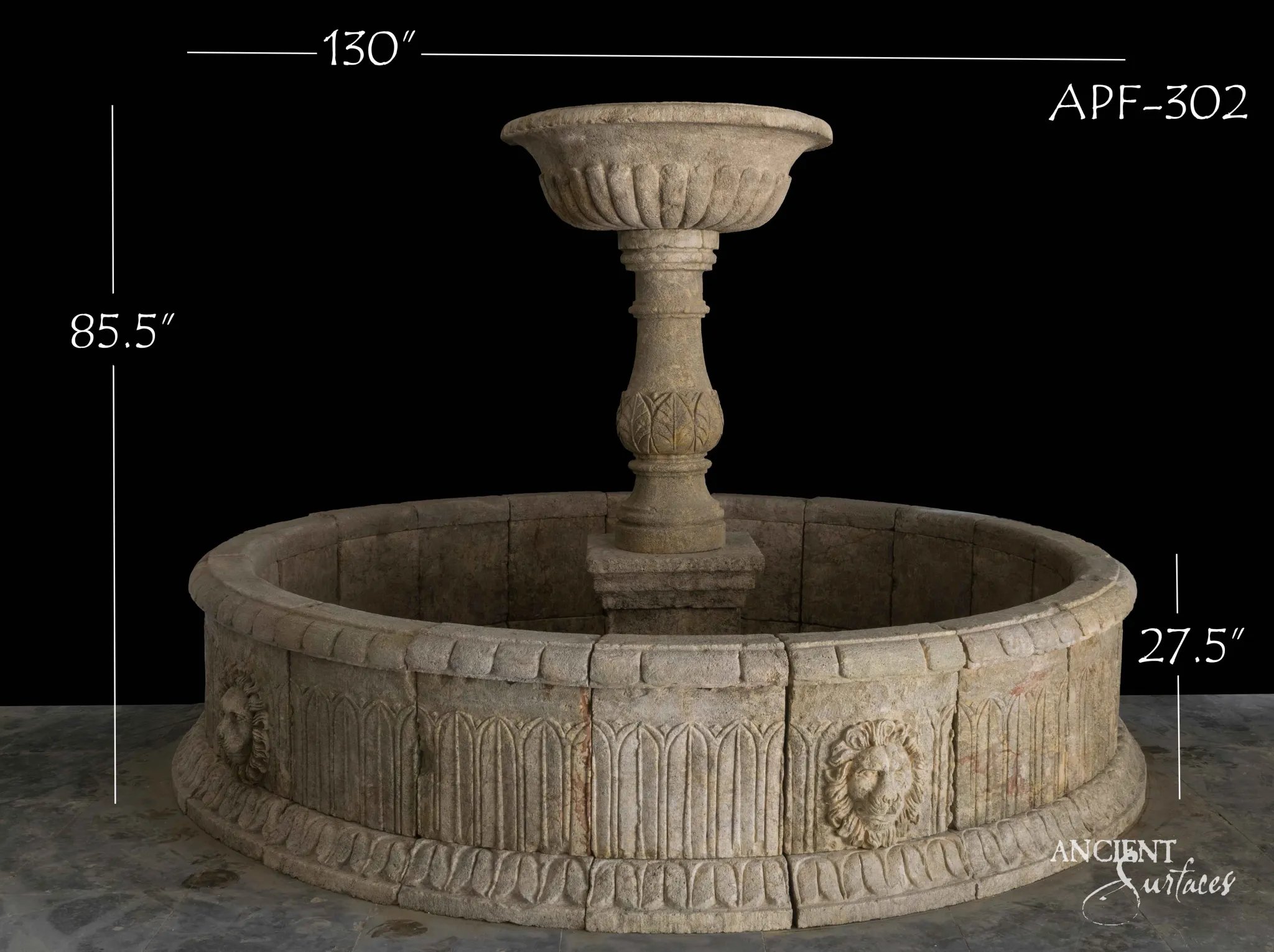 Wide reclaimed antique limestone pool fountain from Ancient Surfaces with a fluted circular basin, lion mask keystones and a gadrooned carved bowl on an acanthus baluster stem